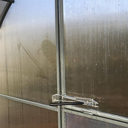 Ouvre-porte automatique pour serre